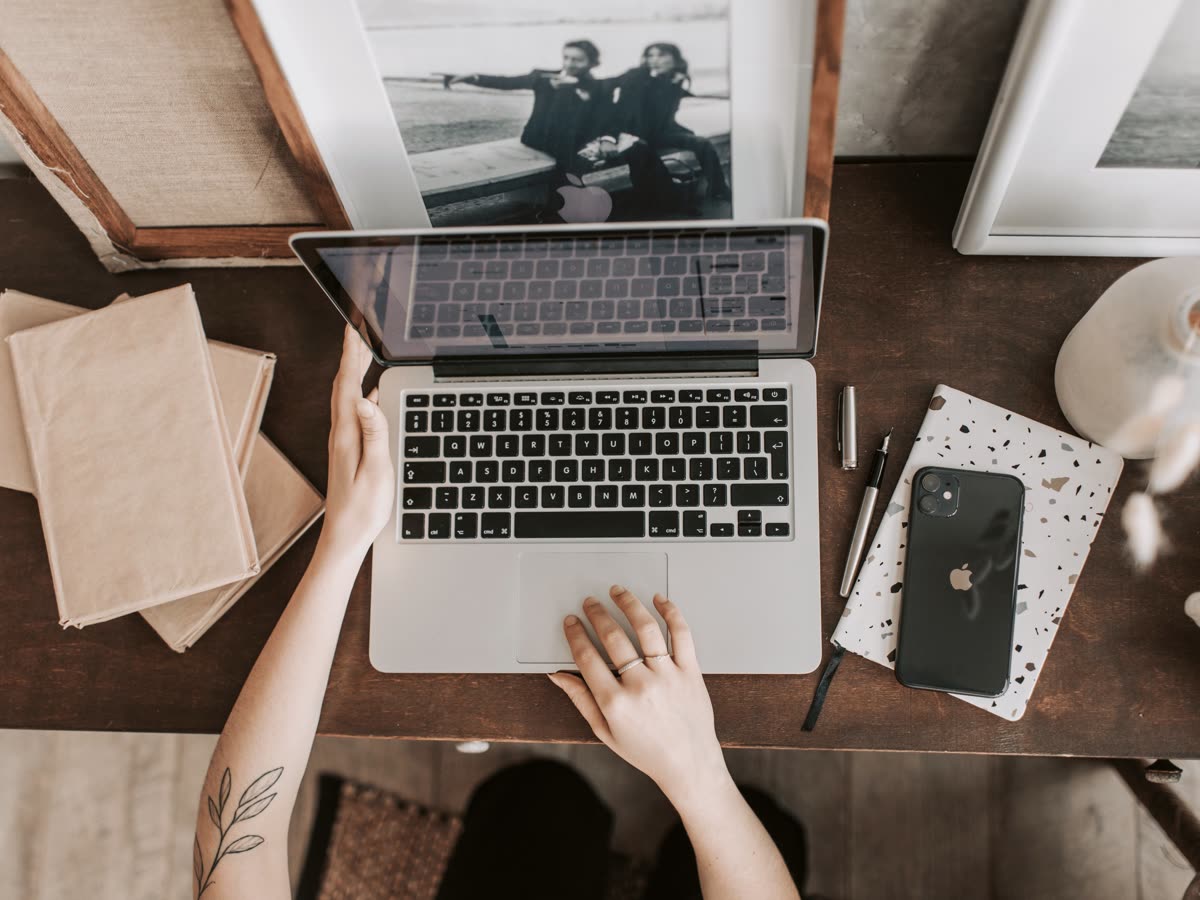 Paid, SEO, and email growth marketing — workspace with laptop and analytics